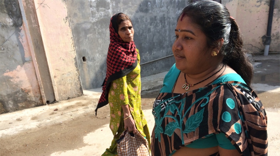Priya Kumar (right) walks freely in her husband's Haryana town, unlike many local women. 